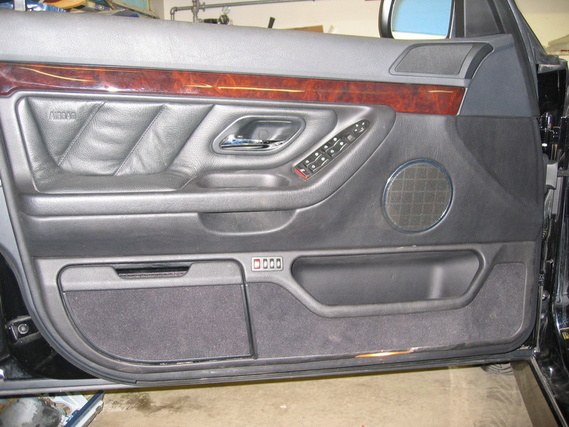 Factory BMW 740 drivers door panel